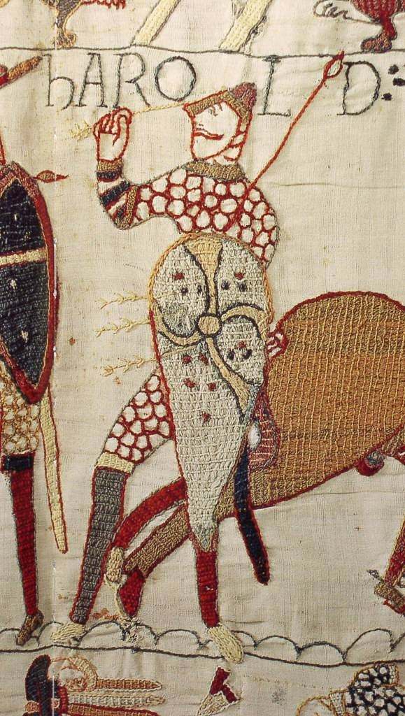 Bildszene aus dem Tepich von Bayeux: Ein normannischer Pfeil dringt Harold Godwinson ins Auge und macht ihn kampfunfähig